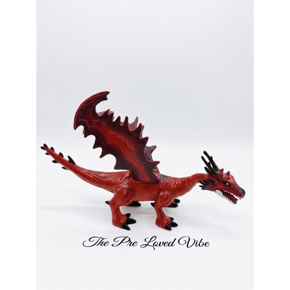 MB Wolverine Holding Plastic Red Winged Dragon Figure Toy